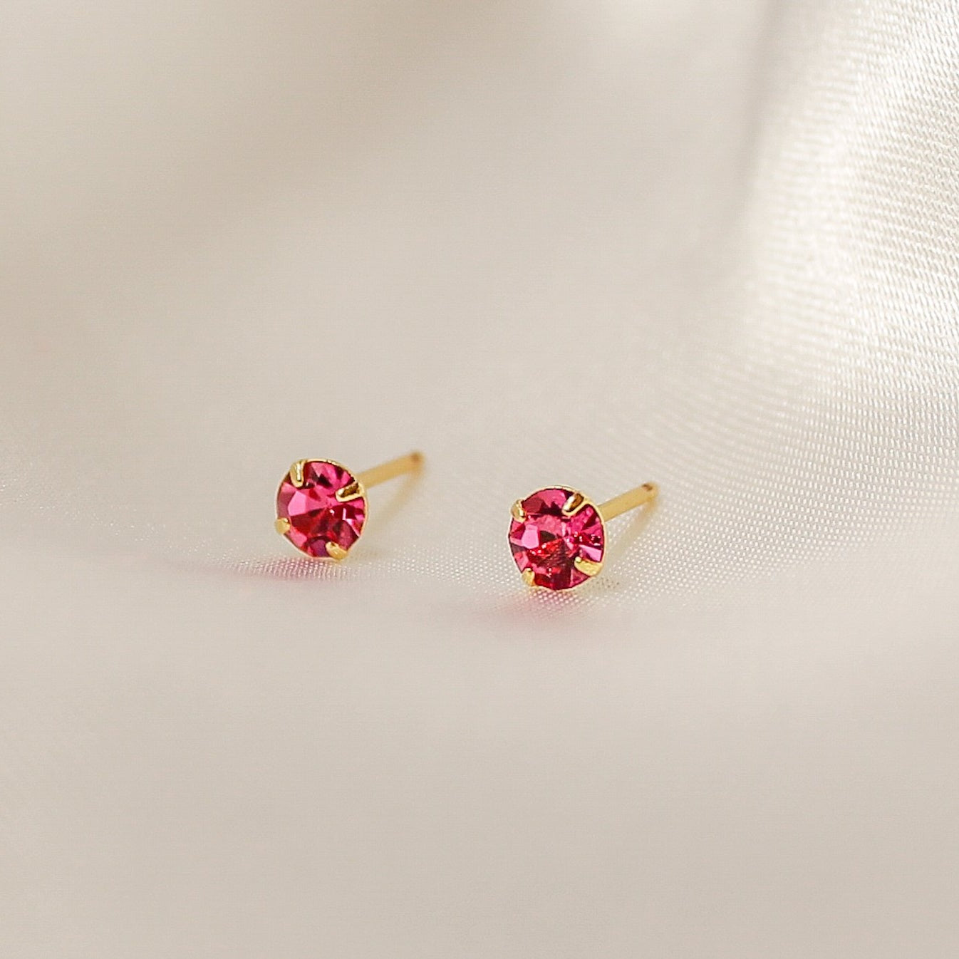 Brinco Ponto de Luz Rosa